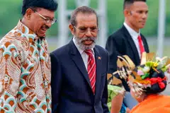 Timor-Leste Prime Minister Taur Matan Ruak (centre) is welcomed by Indonesian Minister of Communication and Information Technology Johnny Plate (left) at Komodo Airport, ahead of the 42nd Asean Summit in Labuan Bajo.