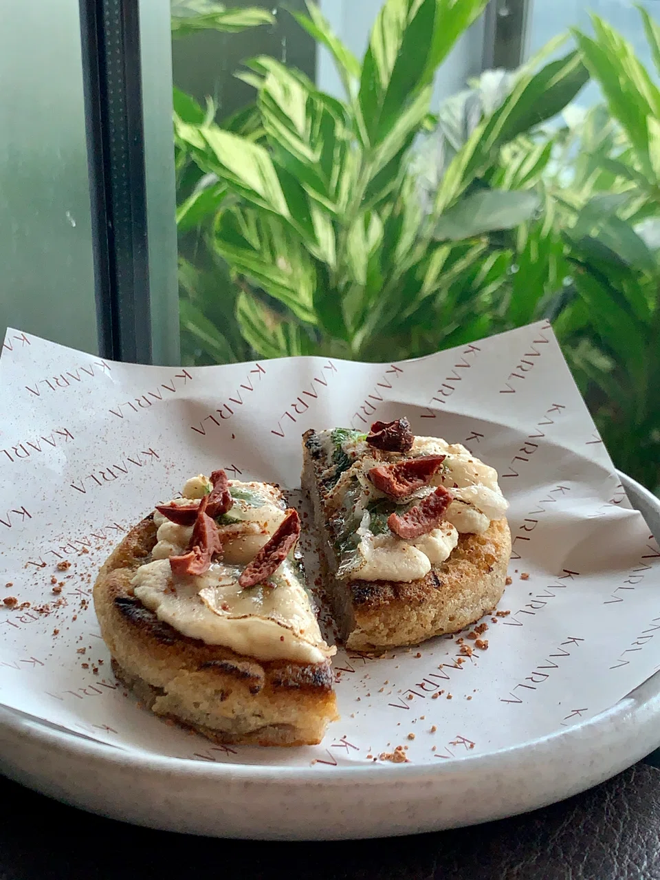 Damper is a yeast-free bread spread with macadamia cream.