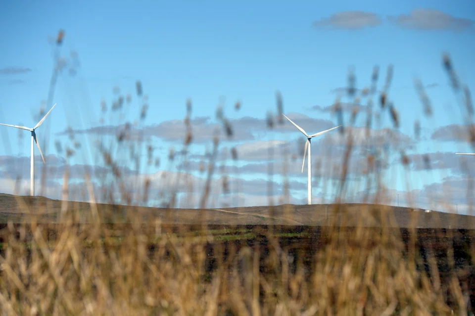 Wind turbines at the Waubra Wind Farm in Victoria, Australia. Until green energy can be produced at scale, divestment from hydrocarbons may raise energy prices for all.