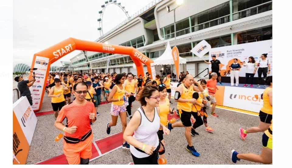 Runners taking off for the 5km Zero Waste Run in 2019. This year, participants are encouraged to wear their own orange T-shirts or past Income Eco Run race T-shirts so as to promote reusing and recycling of existing clothes.