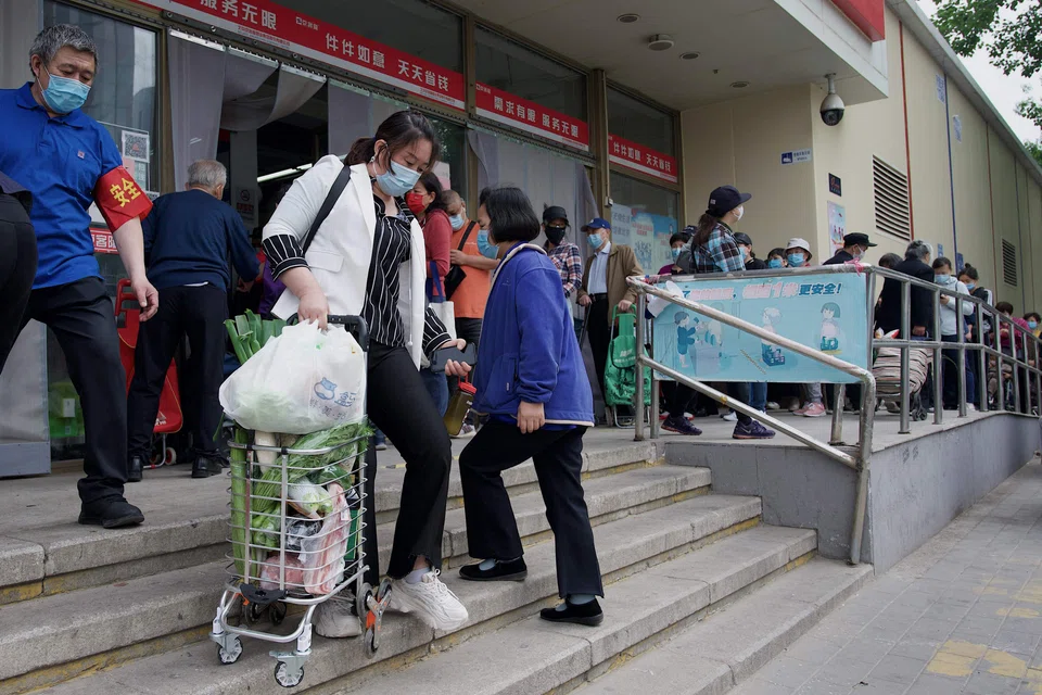 Fears of a hard Covid lockdown sparked panic buying in Beijing as long queues formed on Monday in a large central district for mass testing ordered by the Chinese authorities.