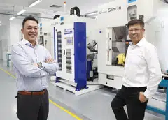 Grand Venture Technology chief executive Julian Ng (left) and executive chairman Ricky Lee. The group saw revenue for Q1 fall 17 per cent to S$26.9 million.