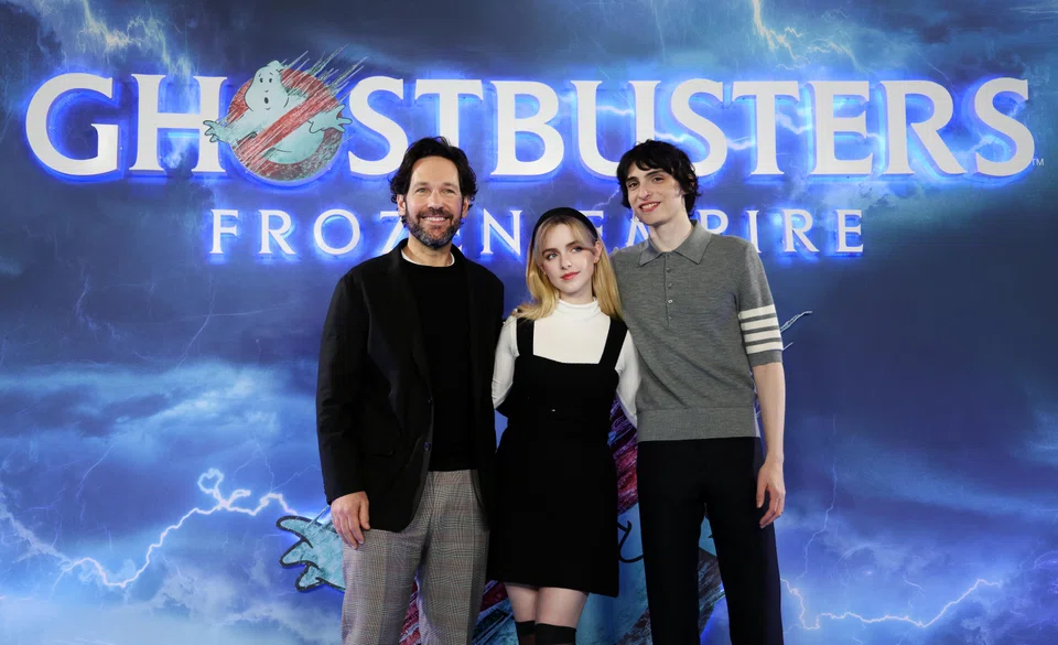 (From left) Paul Rudd, McKenna Grace and Finn Wolfhard at a 'Ghostbusters: Frozen Empire' photocall in London, England, March 21, 2024. 