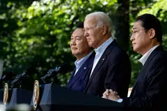 South Korean President Yoon Suk Yeol, US President Joe Biden and Japanese Prime Minister Fumio Kishida hold a joint news conference following three-way talks at Camp David on Aug 18, 2023 in Camp David, Maryland. 