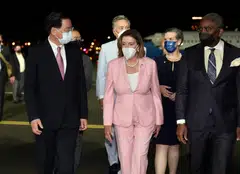 US House Speaker Nancy Pelosi (centre) being greeted by Taiwan Foreign Minister Joseph Wu (left) as she arrives at the Songshan airport in Taipei, Taiwan, Aug 2, 2022. 