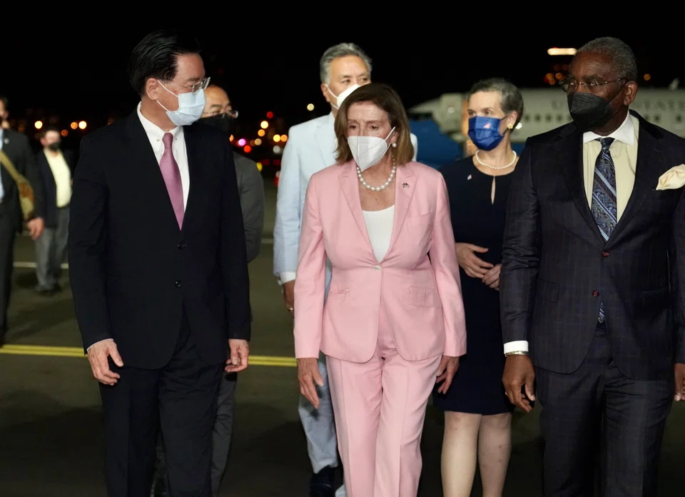 US House Speaker Nancy Pelosi (centre) being greeted by Taiwan Foreign Minister Joseph Wu (left) as she arrives at the Songshan airport in Taipei, Taiwan, Aug 2, 2022. 