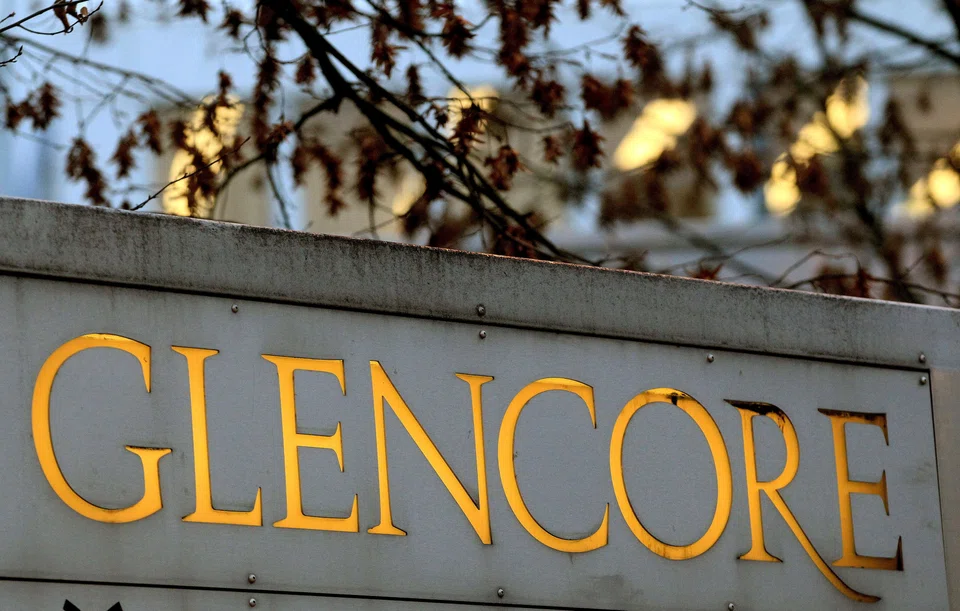 Glencore says the deal's terms include the company receiving US$1.1 billion, as originally agreed in a March deal, but with amended payment terms of US$775 million in cash and up to US$100 million common equity, besides other payments.
