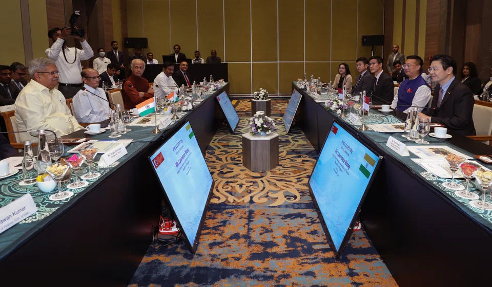 Singapore’s Deputy Prime Minister Lawrence Wong (extreme right) expresses hope that the agreement will open up the space for fintech companies from Singapore and India to experiment and pilot innovative products and services to serve both markets.