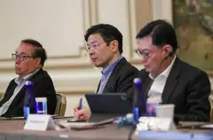 DPM Lawrence Wong (centre) opening the first in-person GIC Investment Forum since the pandemic in New York on Oct 9. With him are GIC's  Peter Seah (left) and DPM Heng Swee Keat. 