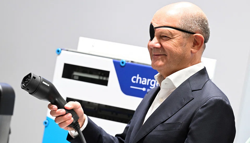 German Chancellor Olaf Scholz announces plans for Germany to lead Europe by implementing a law mandating 80 per cent of service stations to offer fast-charging options of at least 150 kilowatts for electric cars.