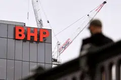 BHP has suffered a sharp profit slump in its fiscal first half. 