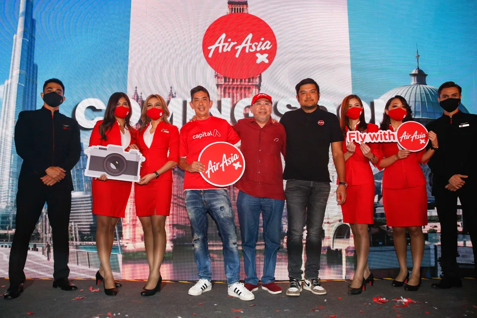 Capital A president (commercial) Colin Currie (fourth from left); Capital A executive chairman Kamarudin Meranun; and AirAsia X CEO Benyamin Ismail at a media event in Kuala Lumpur on June 15, 2022.