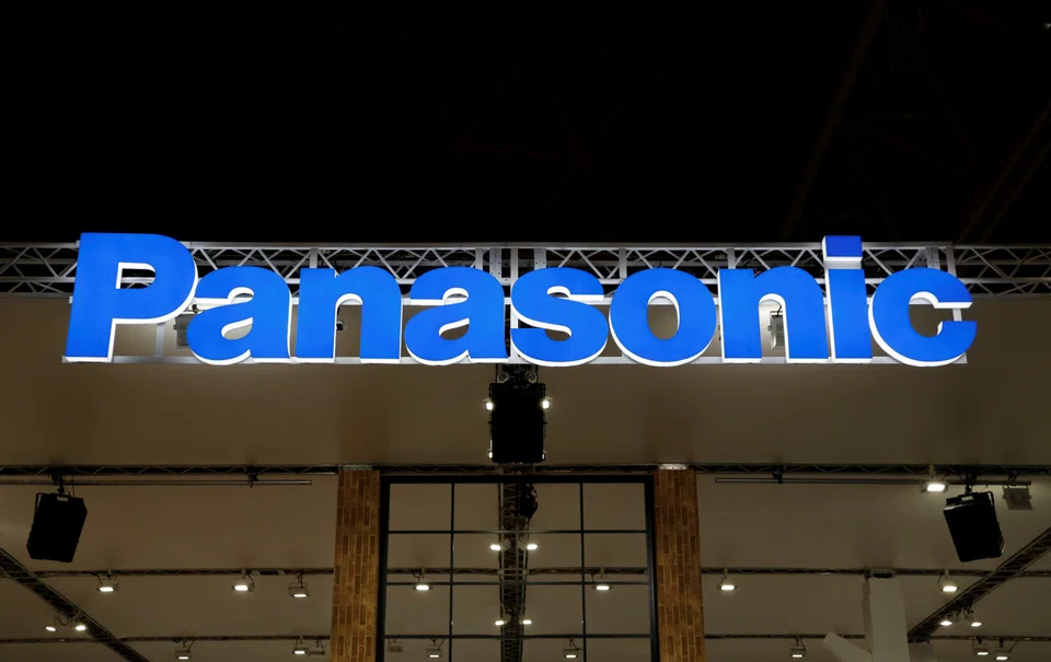 Panasonic lowers its full-year operating profit forecast for the energy unit that makes batteries for Tesla and other automakers to 115 billion yen (S$1.05 billion) from 135 billion yen.