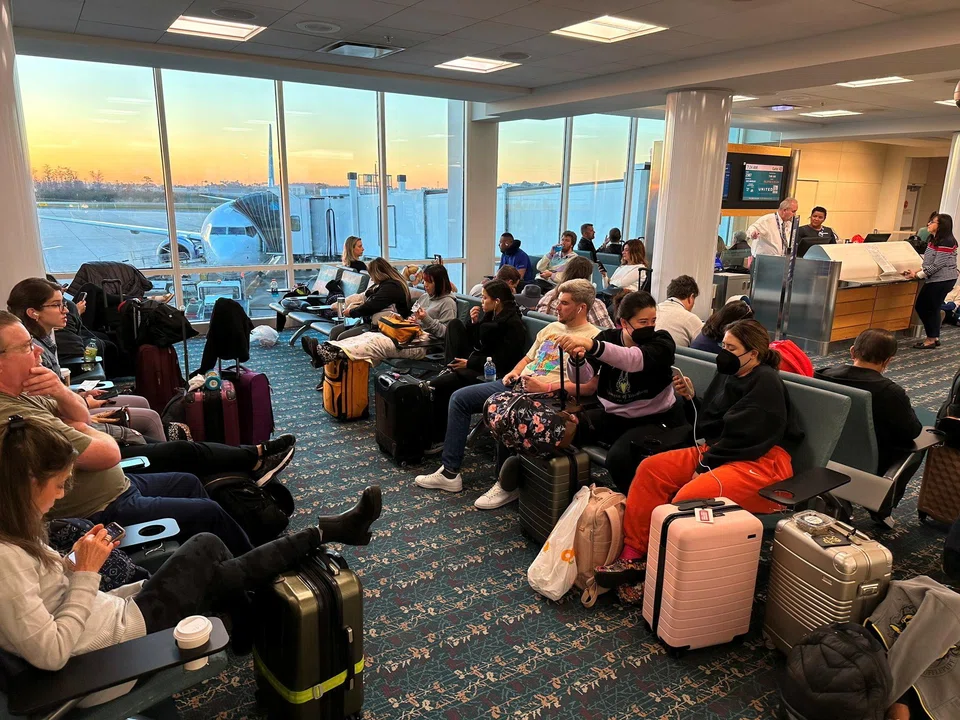 Stranded passengers at the Orlando International Airport, as flights were grounded after FAA system outage on Jan 11.