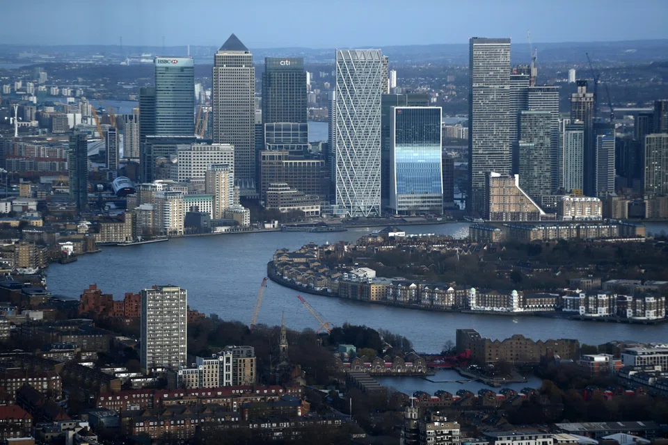 Canary Wharf in the financial district of the City of London. Commercial real estate has been roiled by the dramatic shift in interest rates over the past year, which has begun to hit pricing. 
