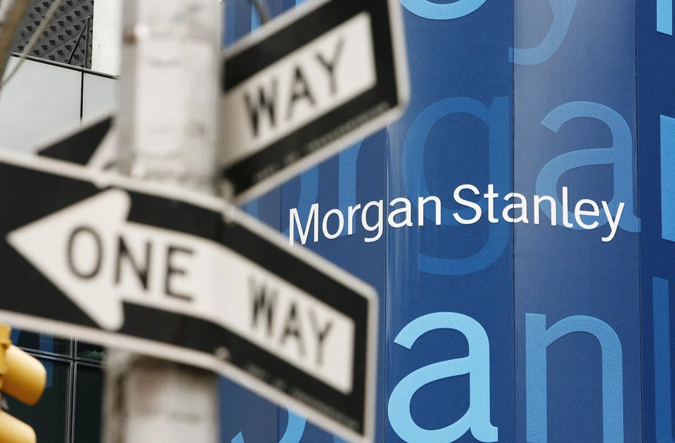 FILE PHOTO: A street sign stands near the Morgan Stanley worldwide headquarters building in New York May 8, 2009. REUTERS/Lucas Jackson/File Photo