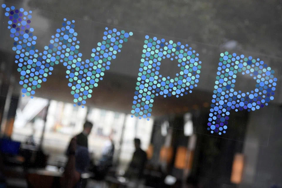 THE world's largest advertising group WPP raised its full-year sales outlook on Wednesday (Apr 27), saying strong client demand had helped it to buck the gloomy mood gripping the global economy.