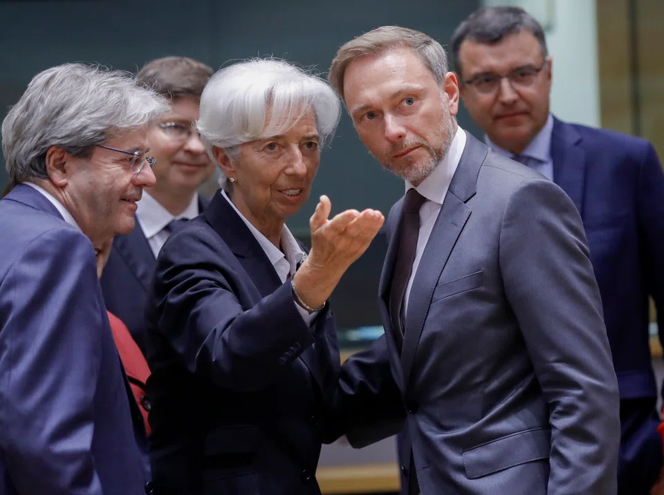 President of the European Central Bank (ECB) Christine Lagarde (centre) with European Commissioner for Economy Paolo Gentiloni (left), and German Finance Minister Christian Lindner at the start of the Eurogroup Finance Ministers meeting in Brussels on Monday (May 23). 