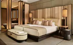 Aman New York, better known as the Crown Building, opened last month and features 83 hotel suites as well as residences. Its luxury spa has an indoor swimming pool surrounded by fire pits. It features 22 private residences, its website shows.