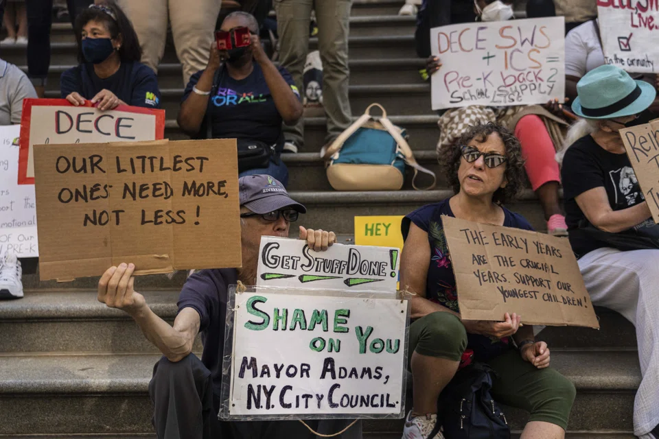 Social workers, educators, and parents participate in a 2022 rally outside Tweed Courthouse on 52 Chambers Street in New York. Although families and providers across the US face the same issues, few cities confront affordability challenges as profound as New York’s. 