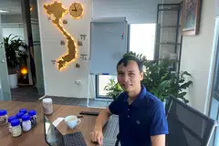 Luu Anh Tuan, chairman of mining company Vietnam Rare Earth JSC (VTRE) in his Hanoi office with samples of rare earth oxides.