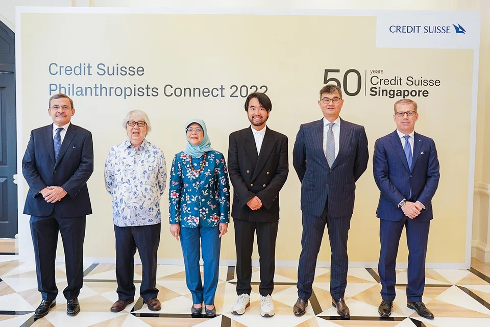 From left: Helman Sitohang, senior advisor, Credit Suisse; Professor Tommy Koh, chairman of SymAsia Foundation; Singapore President Halimah Yacob; Adrian Cheng, chief executive officer, New World Development; Edwin Low, chief executive officer Asia Pacific, Credit Suisse; and Benjamin Cavalli, head of wealth management Asia Pacific, Credit Suisse.
