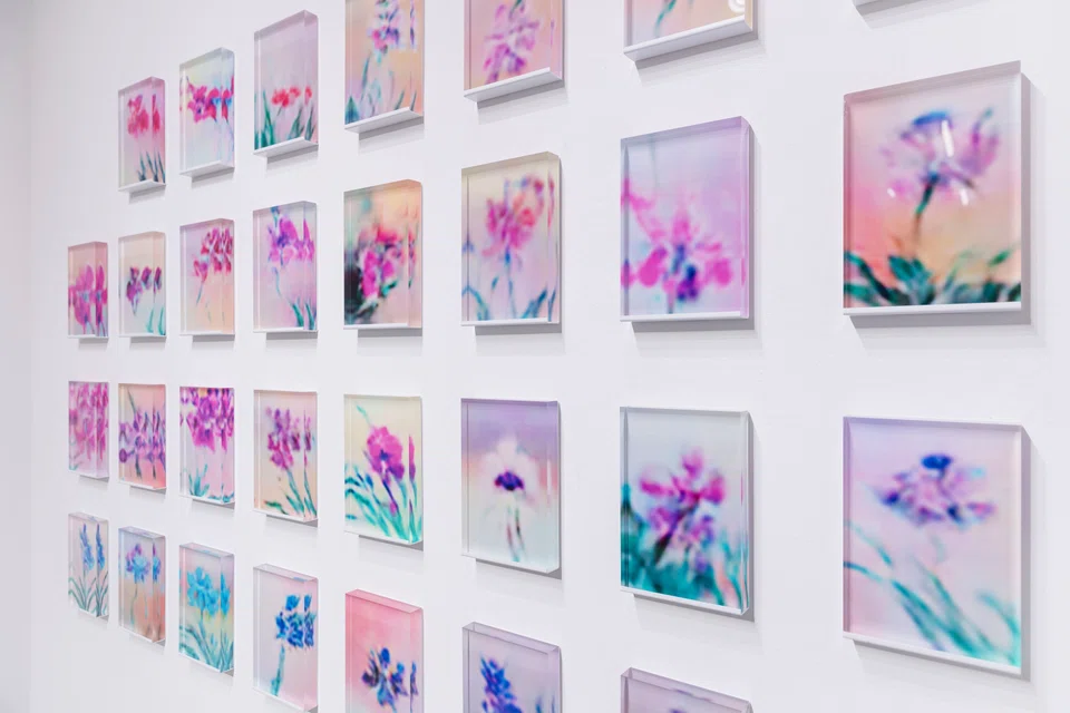 In 1981, Vanda Miss Joaquim was selected as Singapore's national flower out of 40 orchids that were considered. Artist Marvin Tang uses AI to generate what the other 39 orchids that were rejected could look like. 