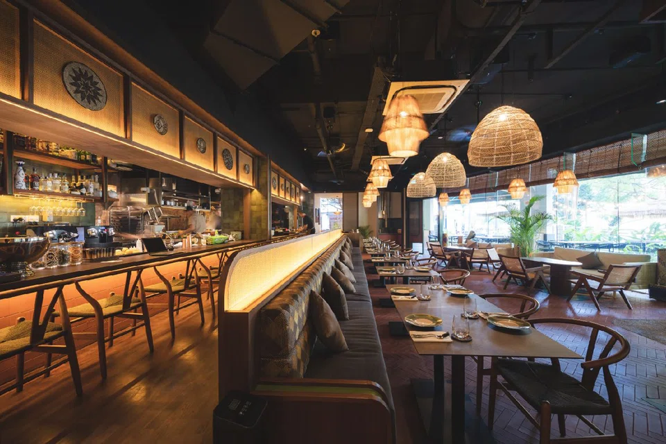 Kubo's tasteful interiors feature wicker furniture and Filipino handicraft.