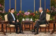 Singapore Prime Minister Lee Hsien Loong (right) with Hong Kong Chief Executive John Lee at the Istana on Monday.