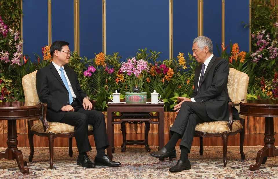 Singapore Prime Minister Lee Hsien Loong (right) with Hong Kong Chief Executive John Lee at the Istana on Monday.
