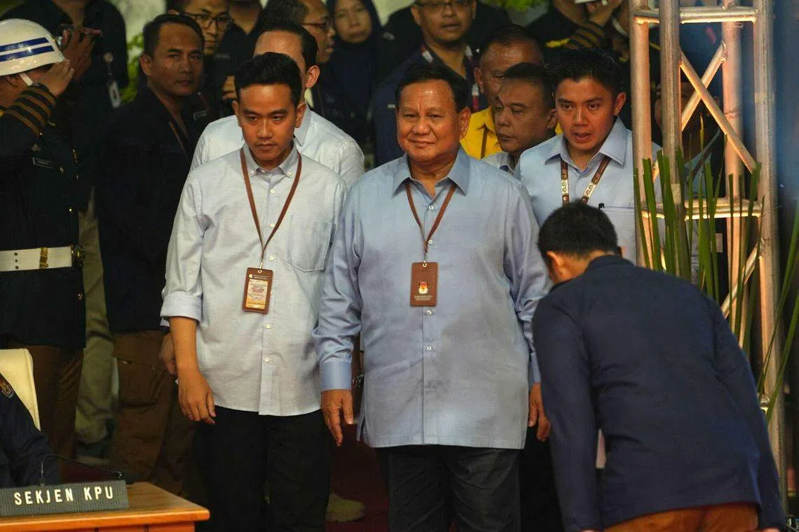 Prabowo Subianto, presidential candidate and Indonesia's defence minister, centre, and Gibran Rakabuming Raka, vice-presidential candidate. Independent poll monitors have so far given no indication of irregularities significant enough to impact the outcome.