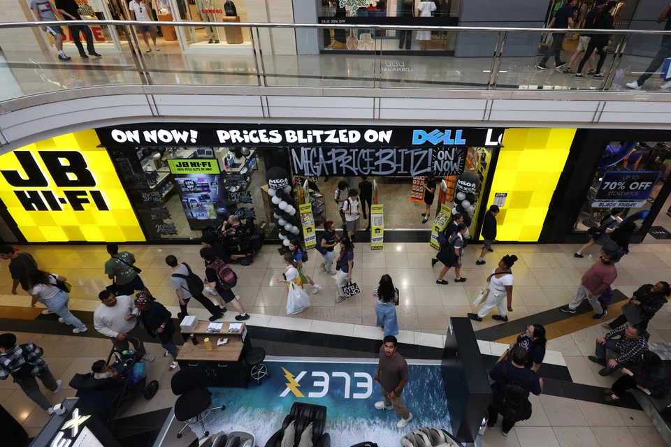 Shoppers walk in a shopping mall during Black Friday sales, Melbourne, Australia, Nov 24, 2023. 