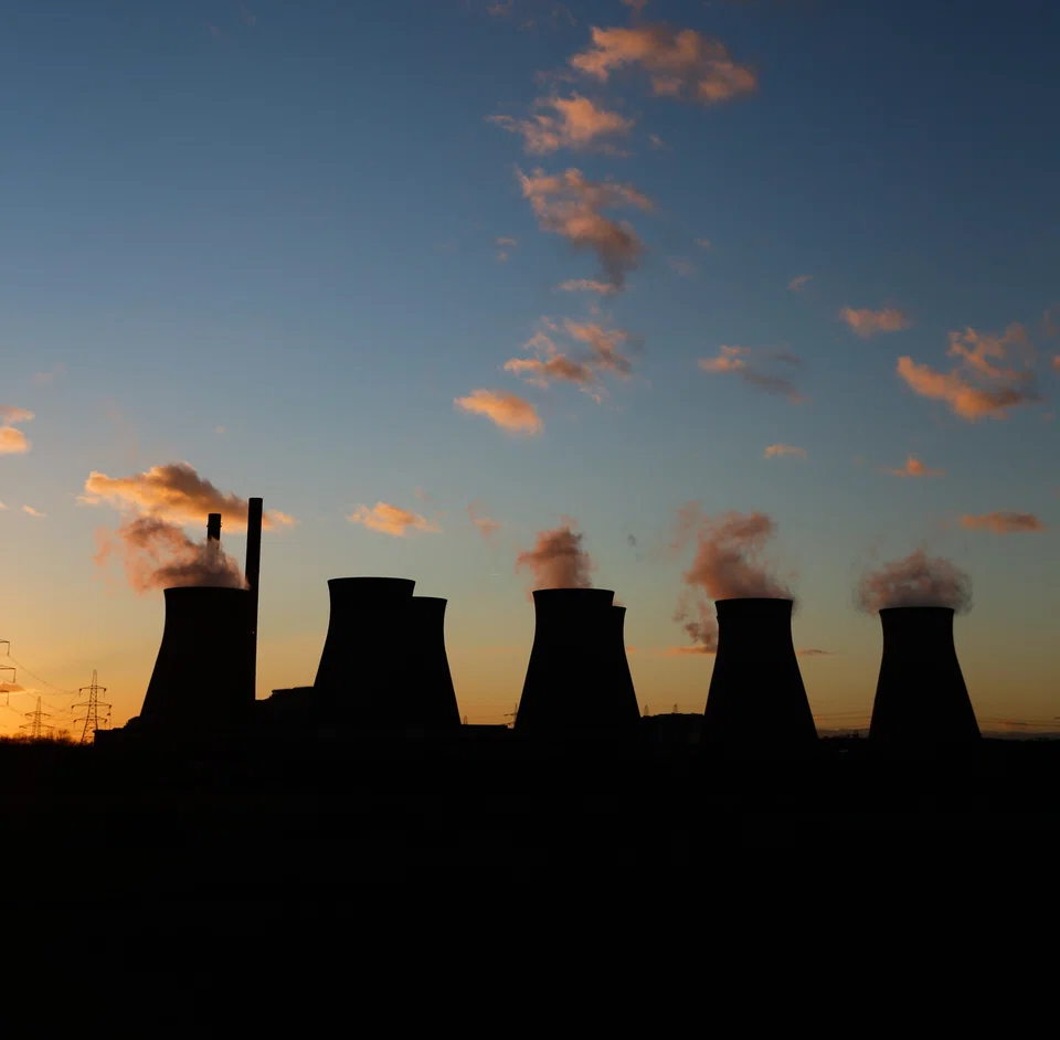 Cooling towers emit vapor at Ferrybridge coal fired power station, operated by SSE Plc, in Ferrybridge, UK. The UK is set to water down one of its key climate change policies as it battles soaring energy prices that have contributed to a cost-of-living crisis for millions of consumers.