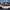 FILE PHOTO: The San Francisco skyline is seen behind a self-driving GM Bolt EV during a media event where Cruise, GM's autonomous car unit, showed off its self-driving cars in San Francisco, California, U.S. November 28, 2017. REUTERS/Elijah Nouvelage/File Photo