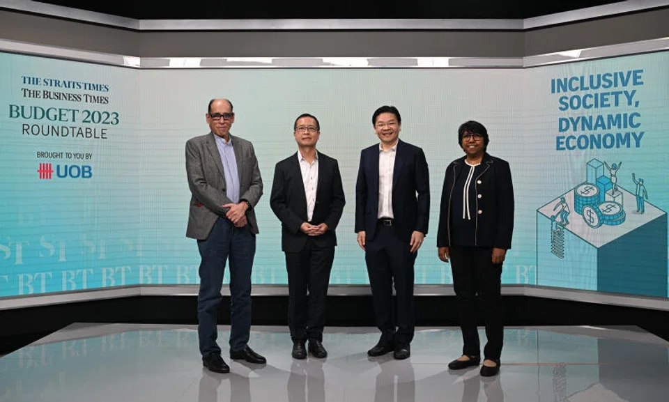 At the ST-BT Budget Roundtable 2023: From left:  Vikram Khanna, associate editor of The Straits Times, Alvin Liew, UOB senior economist, Lawrence Wong, Finance Minister and Deputy Prime Minister and K Thanaletchimi, vice-president of NTUC.
