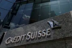 The number of Credit Suisse employees fell to 33,968 at the end of June, from 38,908 a year ago.