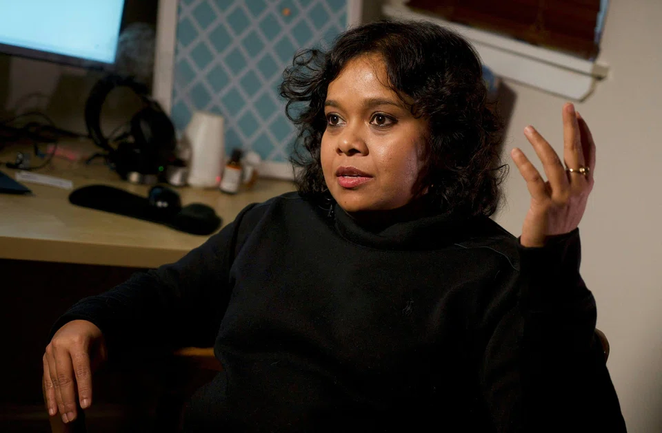 Shreya Datta, a tech professional who was a victim of an online scam known as "pig butchering," speaks during an interview with AFP in her apartment in Philadelphia, Pennsylvania, Feb 9, 2024. 