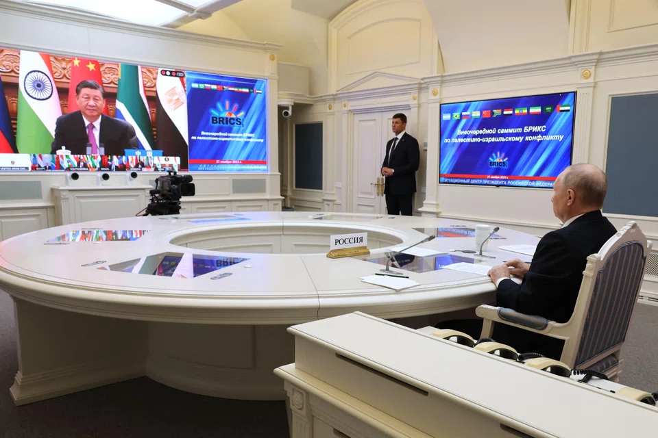 A pool photograph from Russian state agency Sputnik shows Russia's President Vladimir Putin at a virtual summit of the BRICS group of nations (Brazil, Russia, India, China and South Africa) to discuss the Israel-Hamas war, in Moscow on Tuesday (Nov 21.  