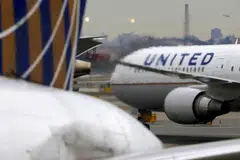 FILE PHOTO: A United Airlines passenger jet taxis at Newark Liberty International Airport, New Jersey, U.S., Dec. 6, 2019. REUTERS/Chris Helgren/File Photo
