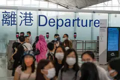 Curbs to control the spread of Covid-19 are partly blamed for a net outflow of 113,200 people from Hong Kong between mid-2021 and mid-2022.