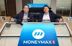 MoneyMax CEO Peter Lim (left) and his son Lim Chun Seng pose in a Volkswagen Type 181 safari vehicle, made in 1976, at the office lobby.