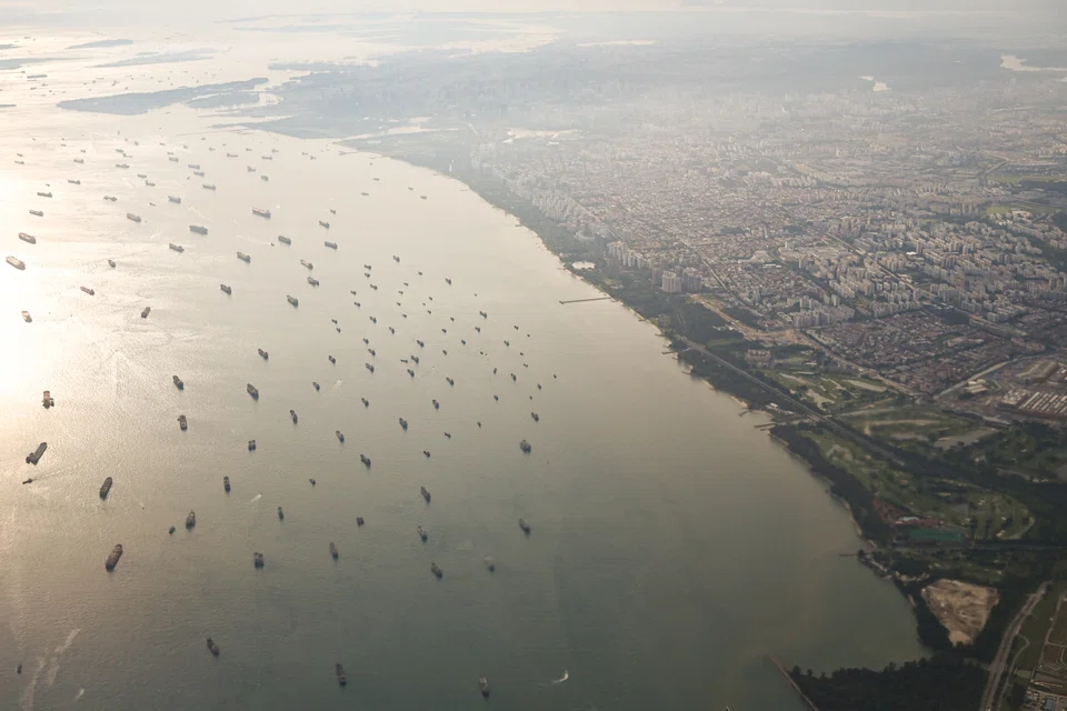 Ships anchored off Marina Bay and East Coast Park. Kwek Kee Seng and Justin Low Eng Yeow were hauled to court as the police found that Kwek had allegedly conspired with five other individuals based overseas to supply some 12,260 tonnes of gasoil to North Korea between September and November in 2019.