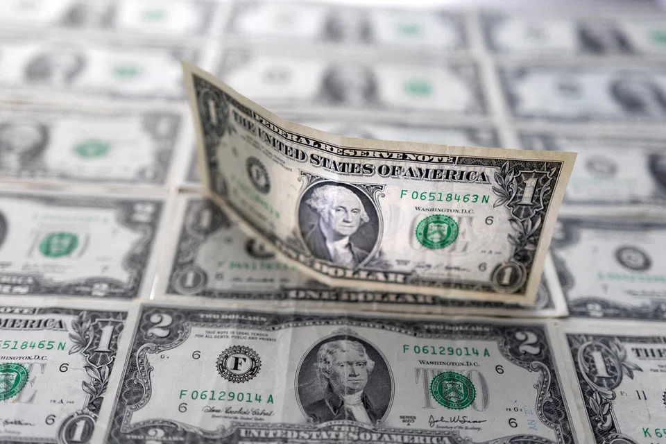 The US dollar index was last at 101.68, down 0.41 per cent on the day.