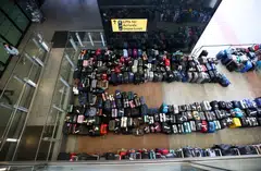 Top airports have been plagued by mountains of misplaced luggage and vast security queues, while some passengers have been stranded on planes owing to shortages of ground staff.