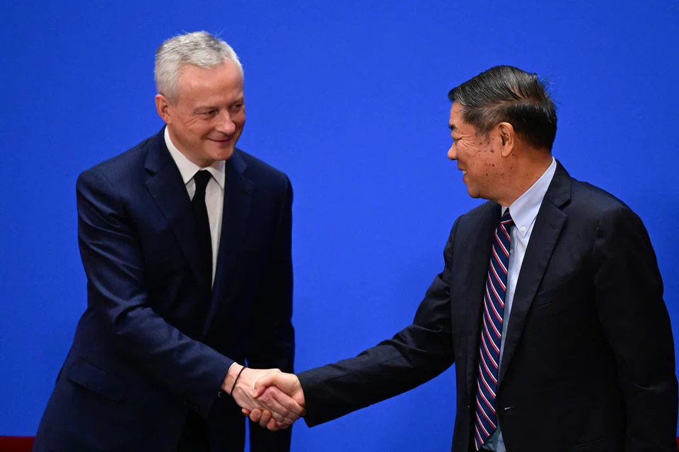 Chinese Vice-Premier He Lifeng (right) with French Finance Minister Bruno Le Maire at Saturday’s meeting; He says China hoped France could “stabilise the tone” of EU-China relations, while Beijing was willing to deepen cooperation with Paris in some areas.