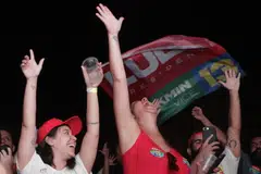 Supporters of the Brazilian presidential candidate Luiz Inacio Lula da Silva celebrate the results of the second round of presidential elections, in Rio de Janeiro, Brazil, Oct 30, 2022.