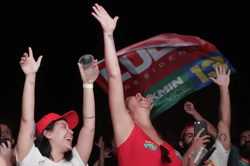 Supporters of the Brazilian presidential candidate Luiz Inacio Lula da Silva celebrate the results of the second round of presidential elections, in Rio de Janeiro, Brazil, Oct 30, 2022.
