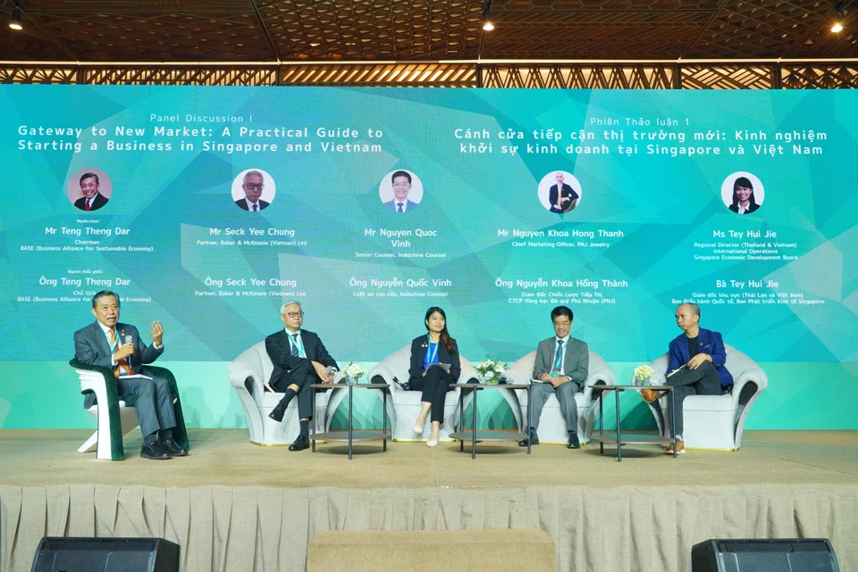 A panel discussion during Spotlight Singapore in Vietnam's business conference in Ho Chi Minh City.