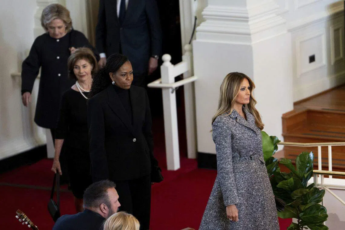 From right: Former first ladies Melania Trump, Michelle Obama, Laura Bush, and Hillary Clinton attend the memorial service for former first lady Rosalynn Carter. It was the first time since George HW Bush's funeral, in 2018, that all the living first ladies had been in one place. 