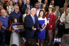 Former US Vice-President Mike Pence, joined by his wife Karen, does a television news interview after formally announcing his intention to seek the Republican nomination for president on June 7, 2023 in Ankeny, Iowa. 